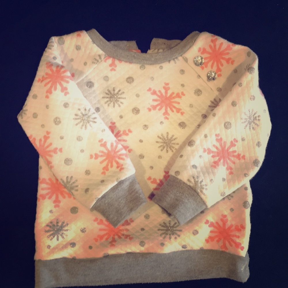 Infant’s adorable snowflake sweater